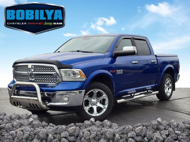Used 2018 RAM 1500 Laramie AWD/4WD image 1