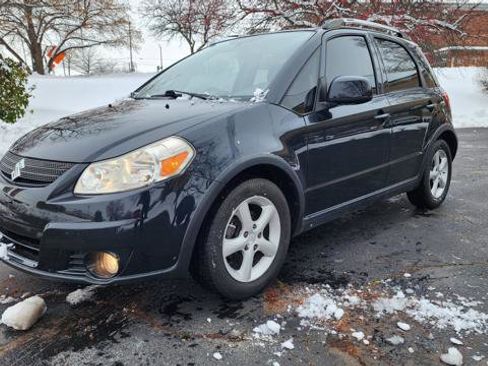 Used 2009 Suzuki SX4 AWD Hatchback w/ Touring Pkg image 2