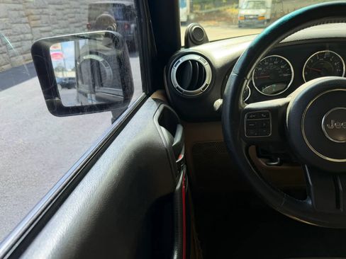 Used 2013 Jeep Wrangler Unlimited Sahara w/ Mopar Chrome Edition Group AWD/4WD image 17