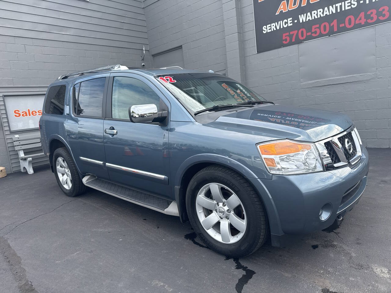 Used 2012 Nissan Armada SL w/ DVD FES Pkg AWD/4WD image 1