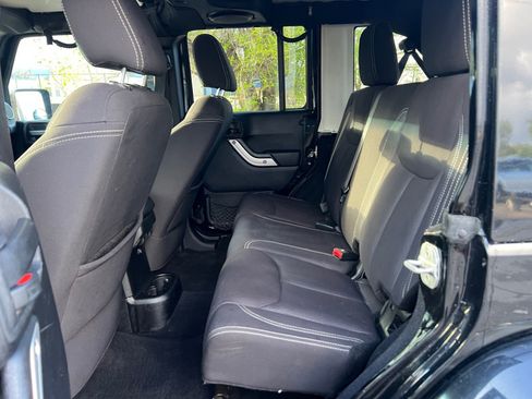 Used 2013 Jeep Wrangler Unlimited Sahara w/ Dual Top Group AWD/4WD image 26