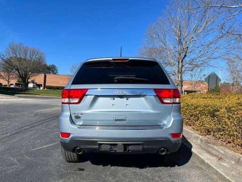 Used 2013 Jeep Grand Cherokee Overland Summit AWD/4WD image 2