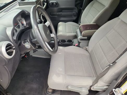 Used 2009 Jeep Wrangler Unlimited Sahara w/ Dual Top Group AWD/4WD image 16