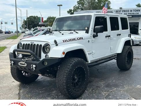 Used 2014 Jeep Wrangler Unlimited Sahara w/ Connectivity Group AWD/4WD image 1