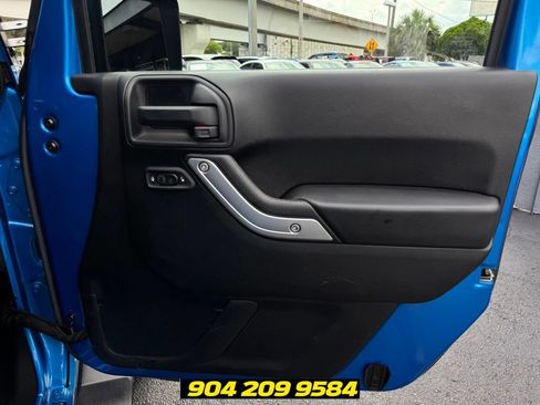 Used 2016 Jeep Wrangler Unlimited Sahara w/ Dual Top Group AWD/4WD image 32