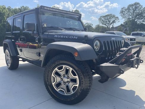 Used 2015 Jeep Wrangler Unlimited Rubicon w/ Connectivity Group AWD/4WD image 1
