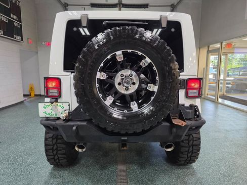 Used 2013 Jeep Wrangler Unlimited Sahara w/ Dual Top Group AWD/4WD image 8