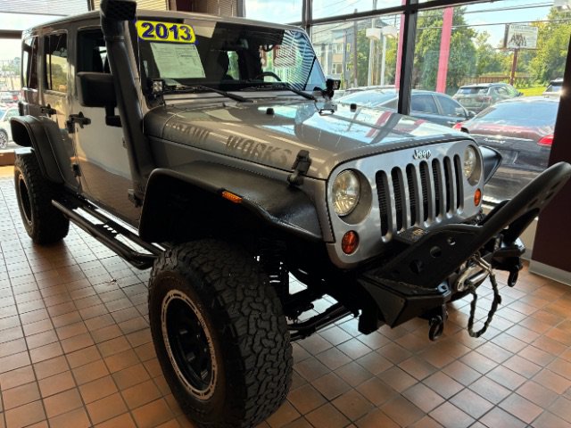Used 2013 Jeep Wrangler Unlimited Sahara w/ Connectivity Group AWD/4WD image 1
