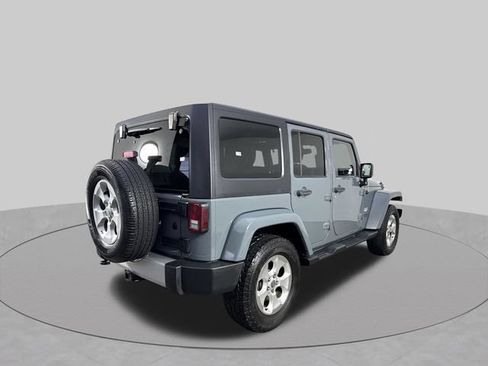 Used 2014 Jeep Wrangler Unlimited Sahara w/ Dual Top Group AWD/4WD image 32