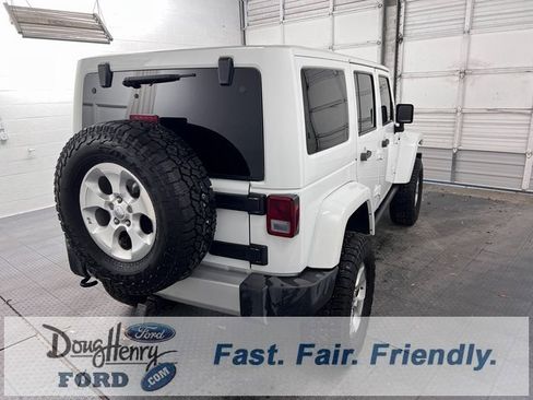 Used 2014 Jeep Wrangler Unlimited Sahara w/ Dual Top Group image 7