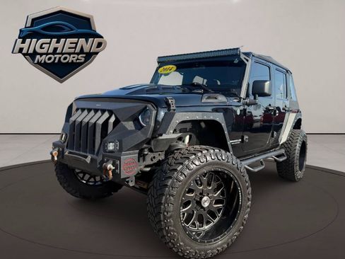 Used 2014 Jeep Wrangler Unlimited Rubicon w/ Dual Top Group AWD/4WD image 2