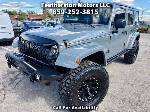 Used 2014 Jeep Wrangler Unlimited Sahara w/ Connectivity Group AWD/4WD image 1