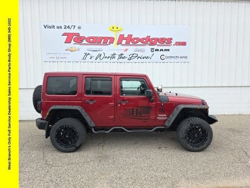 Used 2013 Jeep Wrangler Unlimited Sport AWD/4WD image 1