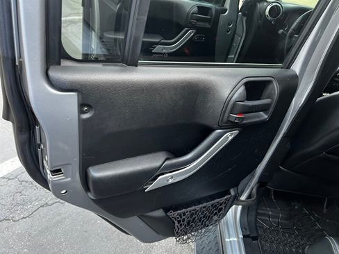 Used 2015 Jeep Wrangler Unlimited Sahara w/ Dual Top Group AWD/4WD image 21