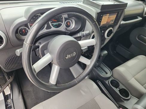 Used 2009 Jeep Wrangler Unlimited Sahara w/ Dual Top Group AWD/4WD image 10