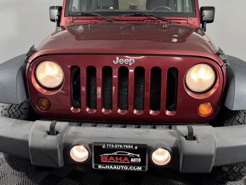 Used 2012 Jeep Wrangler Unlimited Sport AWD/4WD image 9
