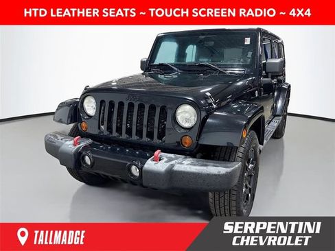 Used 2012 Jeep Wrangler Unlimited Sahara AWD/4WD image 1