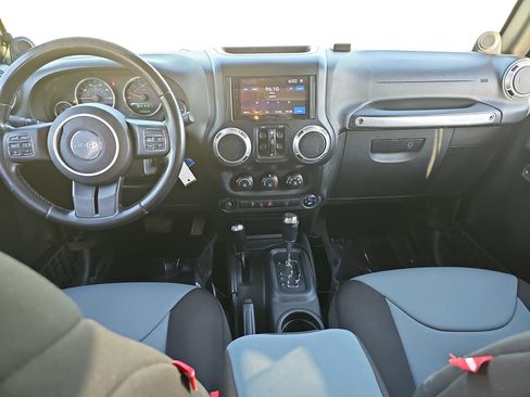 Used 2013 Jeep Wrangler Unlimited Sahara w/ Dual Top Group AWD/4WD image 9