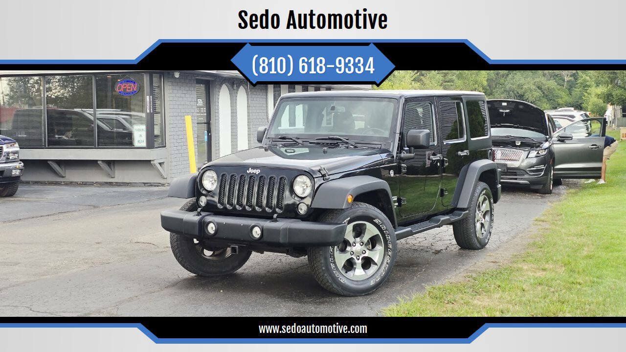 Used 2014 Jeep Wrangler Unlimited Sport w/ Dual Top Group AWD/4WD image 1