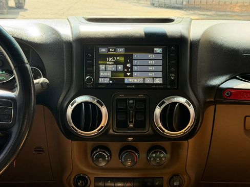 Used 2013 Jeep Wrangler Unlimited Sahara w/ Mopar Chrome Edition Group AWD/4WD image 14