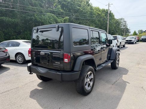 Used 2012 Jeep Wrangler Unlimited Rubicon w/ Dual Top Group AWD/4WD image 5