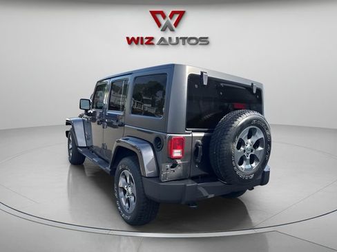 Used 2017 Jeep Wrangler Unlimited Sahara w/ Dual Top Group AWD/4WD image 3