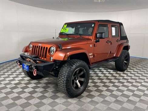 Used 2014 Jeep Wrangler Unlimited Sahara w/ Dual Top Group AWD/4WD image 1