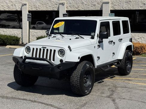 Used 2012 Jeep Wrangler Unlimited Sahara w/ Dual Top Group AWD/4WD image 15
