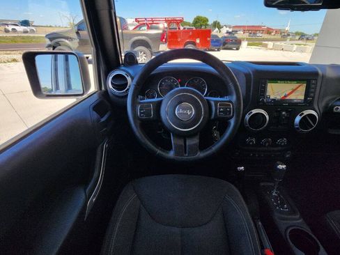 Used 2013 Jeep Wrangler Unlimited Sahara w/ Dual Top Group AWD/4WD image 12