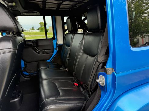 Used 2014 Jeep Wrangler Unlimited Sahara w/ Dual Top Group image 22