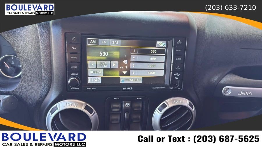 Used 2016 Jeep Wrangler Unlimited Sahara AWD/4WD image 13