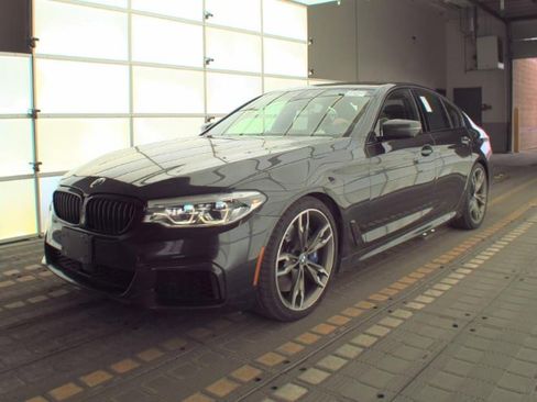 Used 2020 BMW M550i xDrive w/ Executive Package image 1