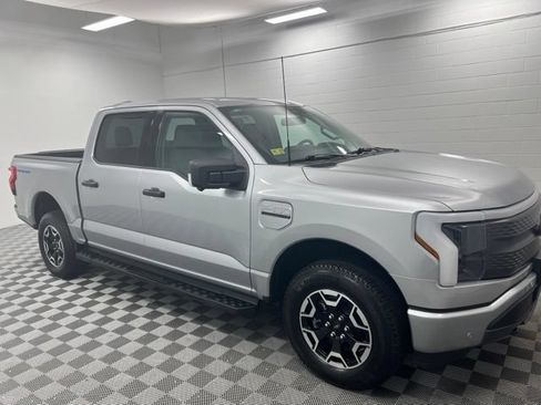 Used 2023 Ford F150 Lightning XLT w/ Tow Technology Package AWD/4WD image 4