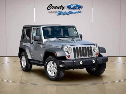 Used 2013 Jeep Wrangler Sport AWD/4WD image 1