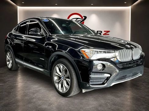 Used 2018 BMW X4 xDrive28i AWD/4WD image 1