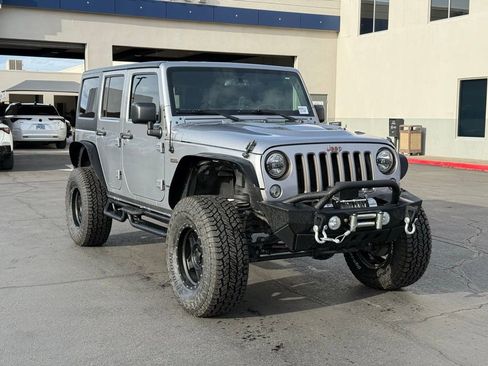 Used 2016 Jeep Wrangler Unlimited Sahara image 1