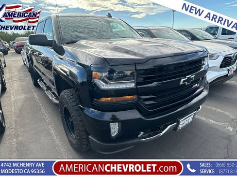 Used 2018 Chevrolet Silverado 1500 LT w/ LPO, Black Pack AWD/4WD image 1
