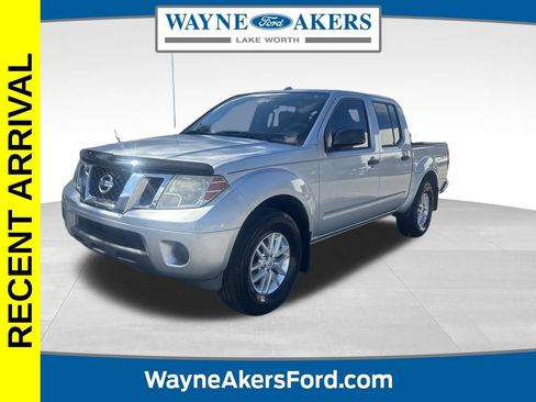 Used 2014 Nissan Frontier SV image 1