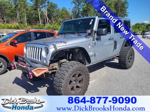 Used 2014 Jeep Wrangler Unlimited Sahara w/ Connectivity Group AWD/4WD image 1