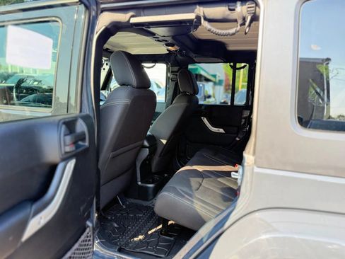 Used 2016 Jeep Wrangler Unlimited Sahara w/ Dual Top Group AWD/4WD image 11