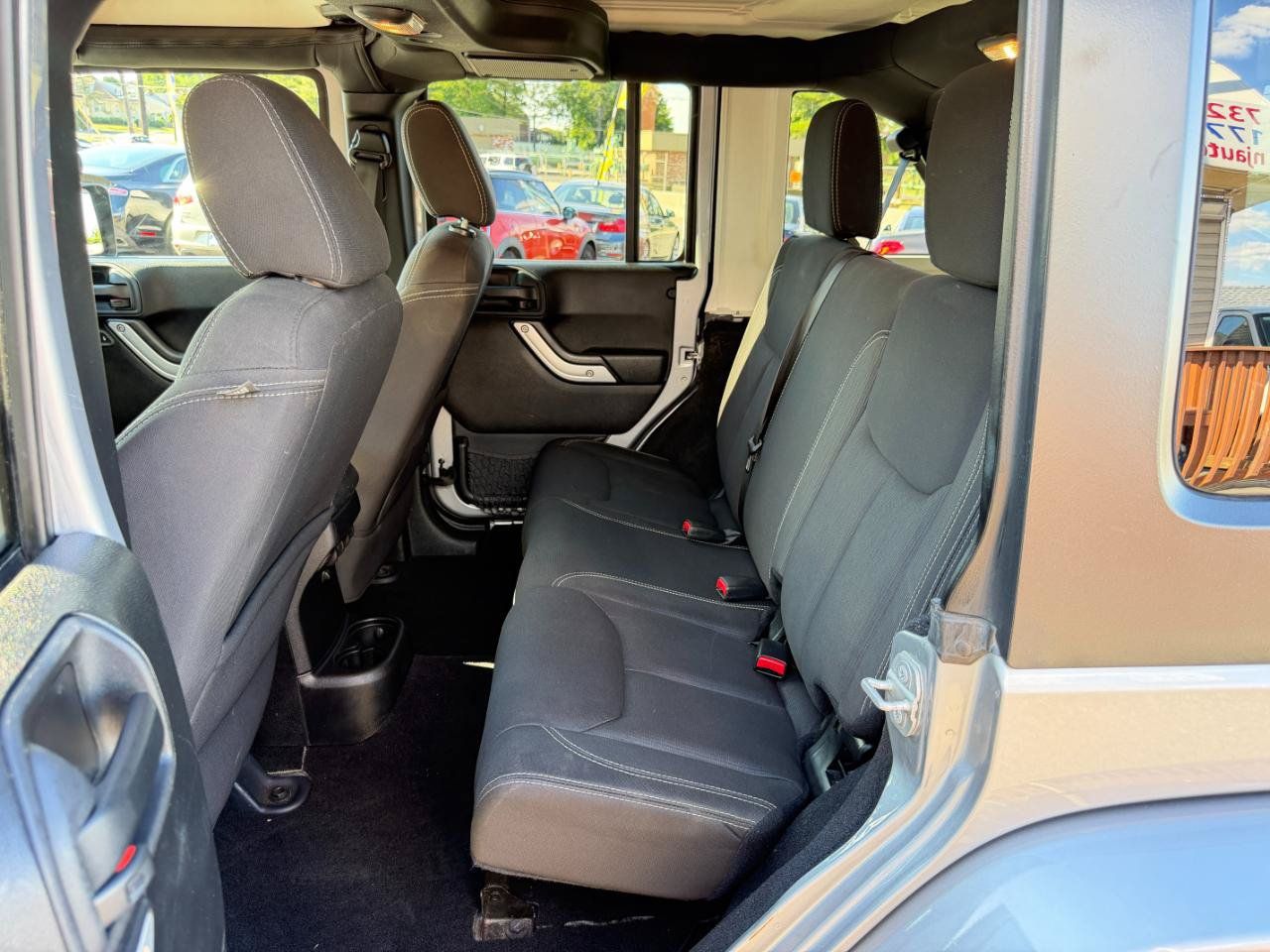 Used 2015 Jeep Wrangler Unlimited Sahara w/ Dual Top Group AWD/4WD image 28