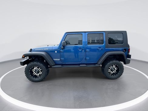 Used 2010 Jeep Wrangler Unlimited Rubicon w/ Dual Top Group AWD/4WD image 5