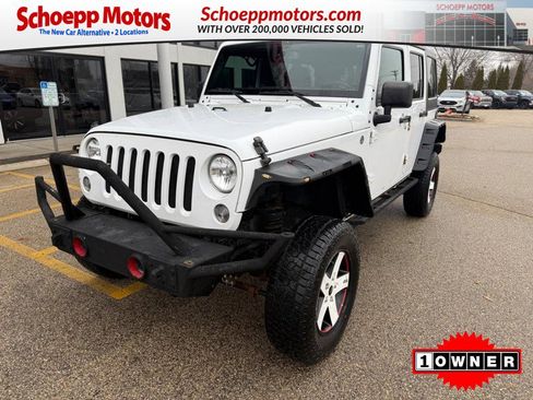 Used 2015 Jeep Wrangler Unlimited Sahara w/ Dual Top Group image 1