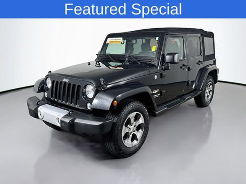Used 2015 Jeep Wrangler Unlimited Sahara w/ Max Tow Package AWD/4WD image 1