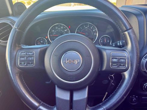 Used 2013 Jeep Wrangler Unlimited Sport AWD/4WD image 23