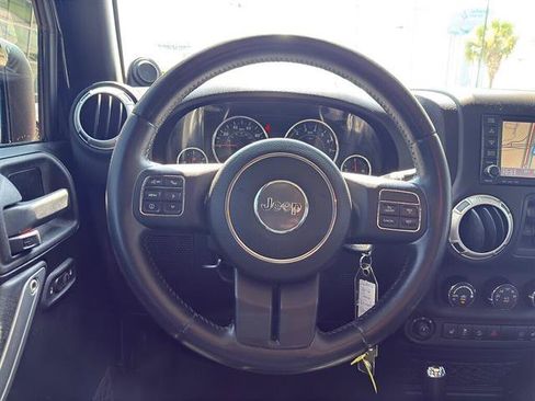 Used 2012 Jeep Wrangler Unlimited Sahara w/ Mopar Chrome Edition Group AWD/4WD image 11