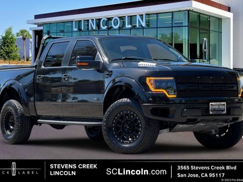 Used 2014 Ford F150 Raptor w/ Exterior Graphics Package AWD/4WD image 1