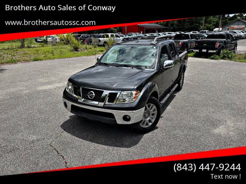 Used 2011 Nissan Frontier SL RWD image 1