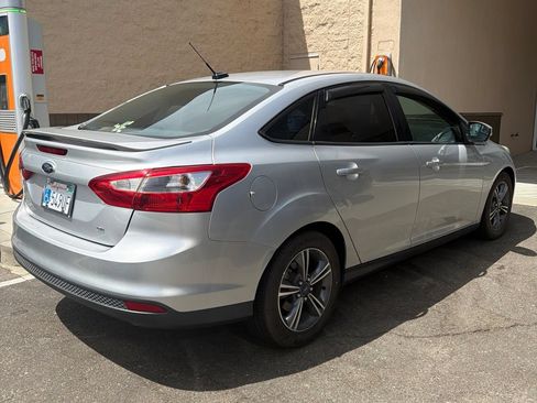 Used 2014 Ford Focus SE w/ SE Sport Package FWD image 1
