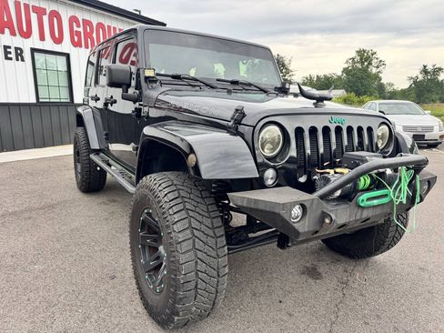 Used 2014 Jeep Wrangler Unlimited Rubicon w/ Dual Top Group AWD/4WD image 4